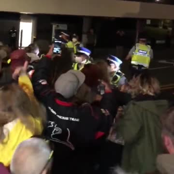 New Zealand Haka men PUSH POLICE to allow new cars into the "Protected" area