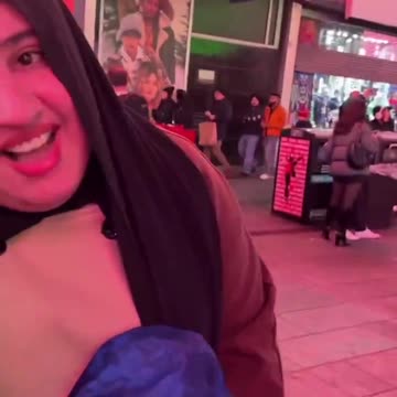 An "11-year-old" Muslim girl with her family telling jew to kill himself