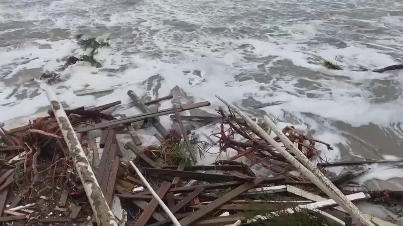 Tropical Storm Nicole topples beachfront homes