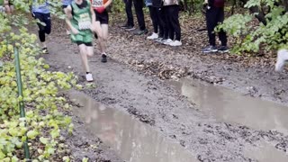 Athlete Dives Into Mud Puddle During Race