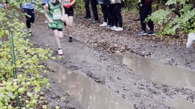 Athlete Dives Into Mud Puddle During Race