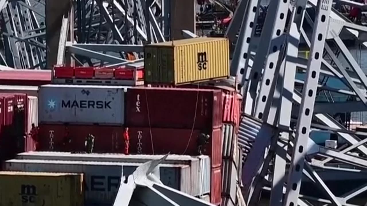 Workers Have Started Removing Shipping Containers From The Cargo Vessel That Is Pinned Under The Remains Of Baltimore Bridge