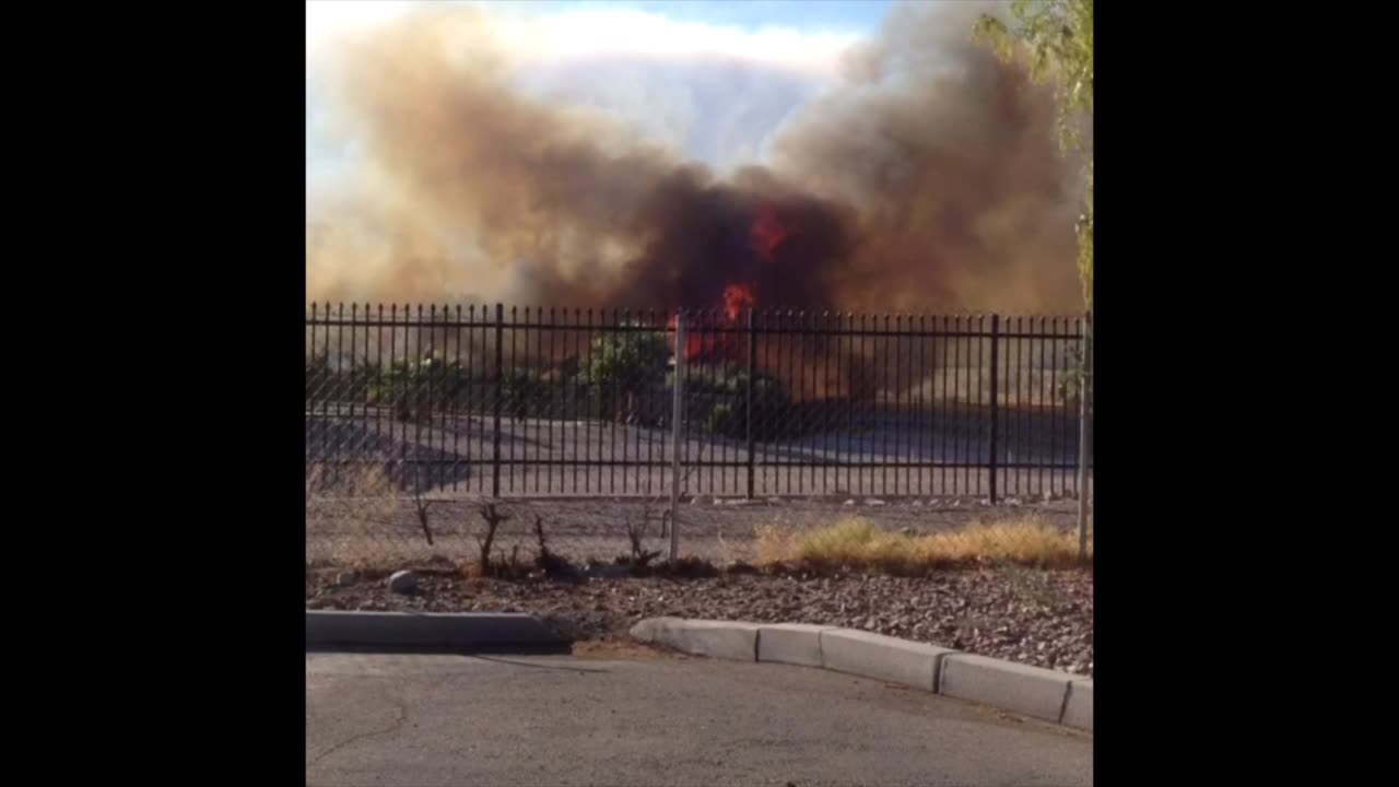 We saw a fire while we were driving on the street.