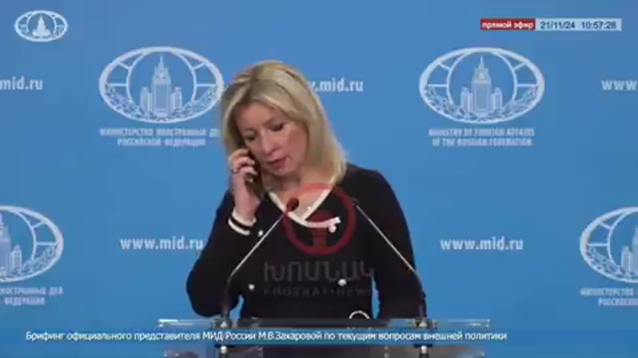 Maria Zakharova, spokeswoman for Russia's foreign ministry, takes phone call during press conference