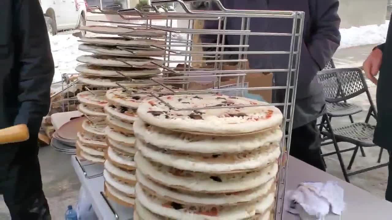 Meanwhile in Ottawa, truckers make pizzas for anyone wanting one.