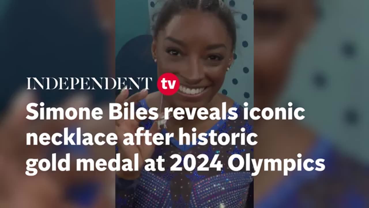 Simone Biles celebrates her gold medal with a diamond goat necklace