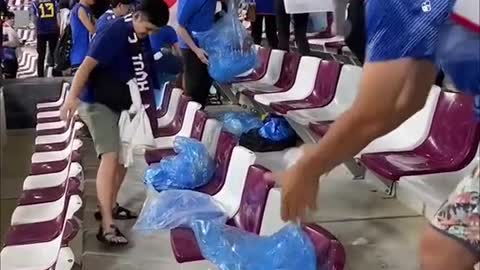 Japan fans clean up stadium after historic win over Germany