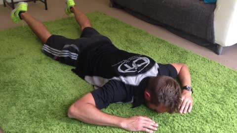 Dom Thorpe demonstrates on YouTube, how to do back exercises like dorsal raises)