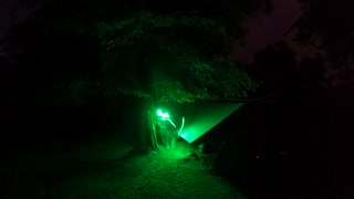 Tieing out guy ropes on a tarp night ropes