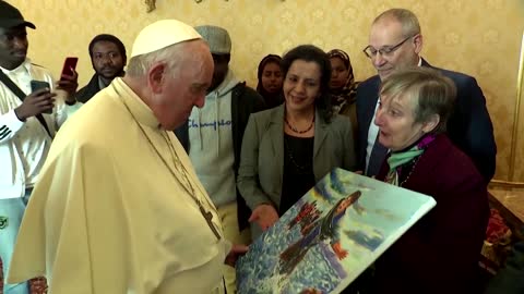 Pope meets migrants on his birthday