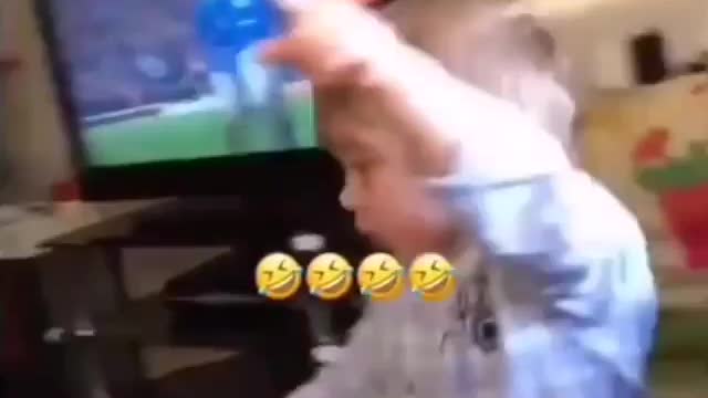 Young fan reacts on scored goal