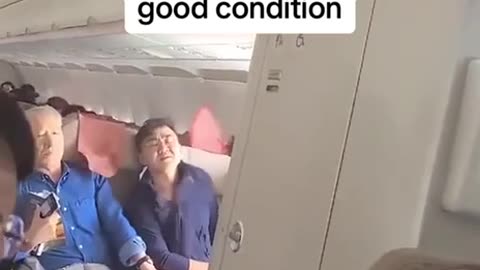 What happens when someone opens a door while in flight on a plane