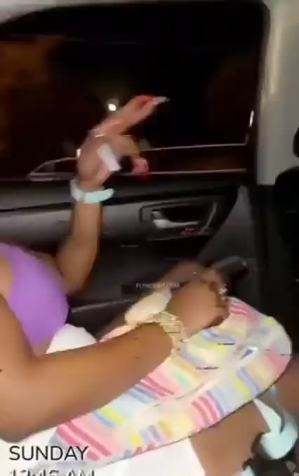 Black woman points a gun at the White Uber driver’s back.