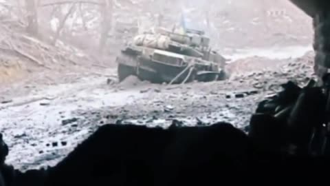 Ukrainian fighter filming his partner's tank destroyed