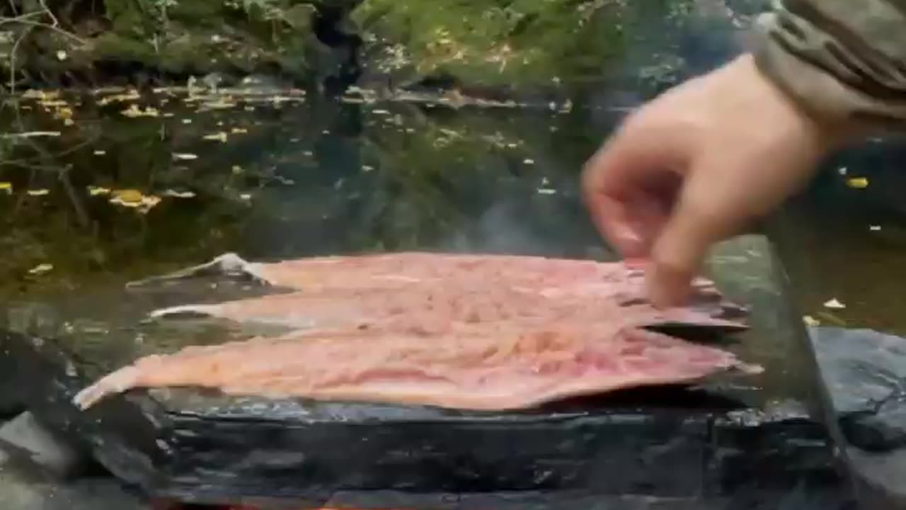 Cooking fish outdoors