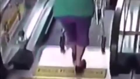 An Old Woman fell down the escalator and fighting for her life to live