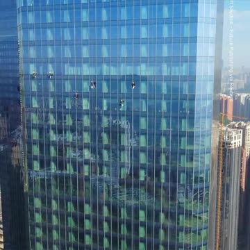 Window Washers Work on a 92-Floor Skyscraper
