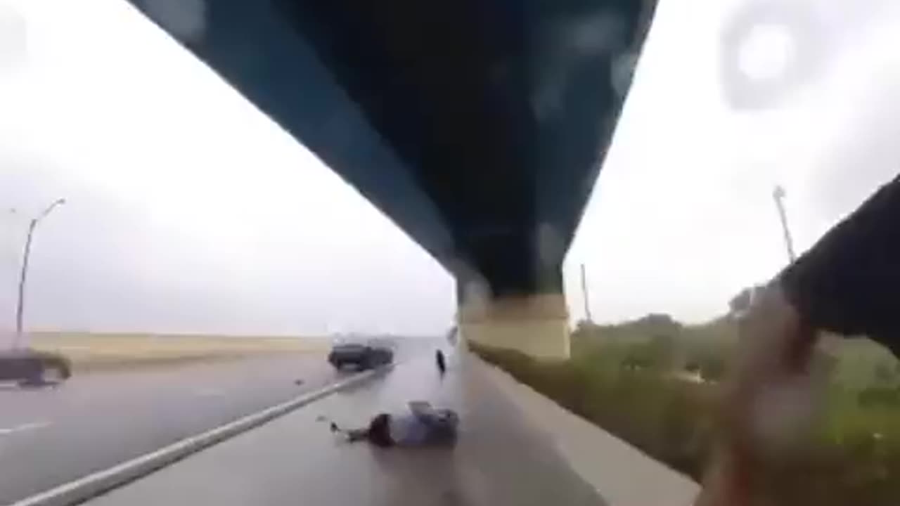 Woman gets hit by Tire on the highway