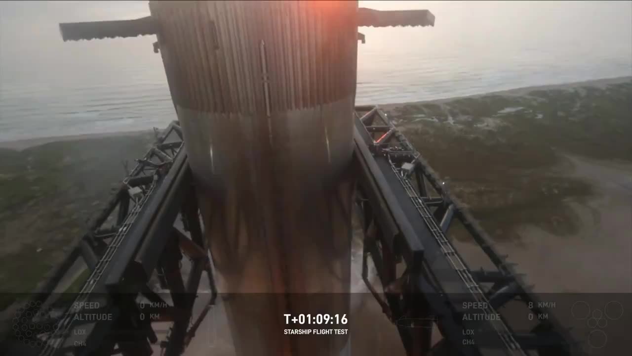 The closeup catching / landing shot of the super heavy booster shimmying along the chopsticks