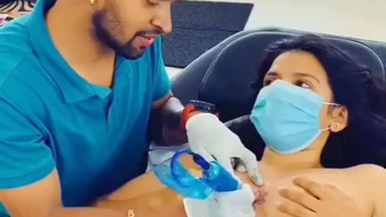 Asian Beauty Getting A Tatoo