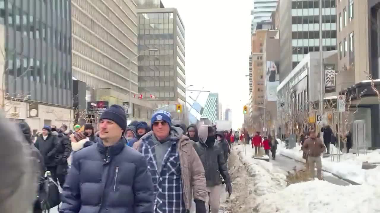 Truckers Freedom Convoy: Peaceful Crowds March Throughout the Streets - Chants of "Freedom"