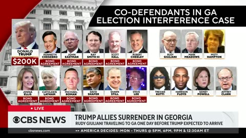 More Trump co-defendants surrender in Georgia; debate set to go on without former president