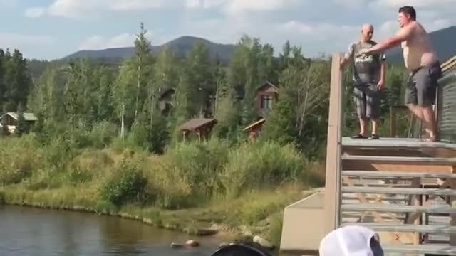 Guy Falls Face-First Into Water While Attempting to Jump Over Handrail and Dive