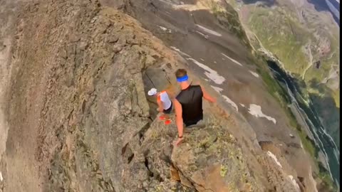 3 Guys Training Together Jogging on Top of a Mountain Route