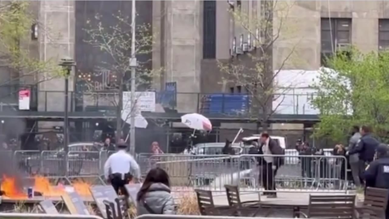 Protester at Trump court sets himself on fire