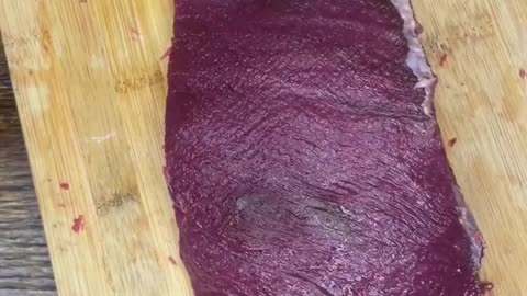 Cleaning up a bottom round roast from a deer