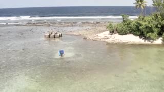 Tuvalu minister gives COP26 speech from the sea