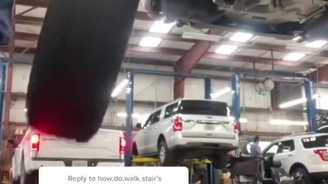 Tech guy installs tires