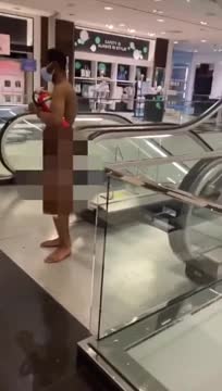 Naked Guy in a San Francisco Store Gets Knocked out By Another Person