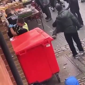 British police are beaten by immigrants.