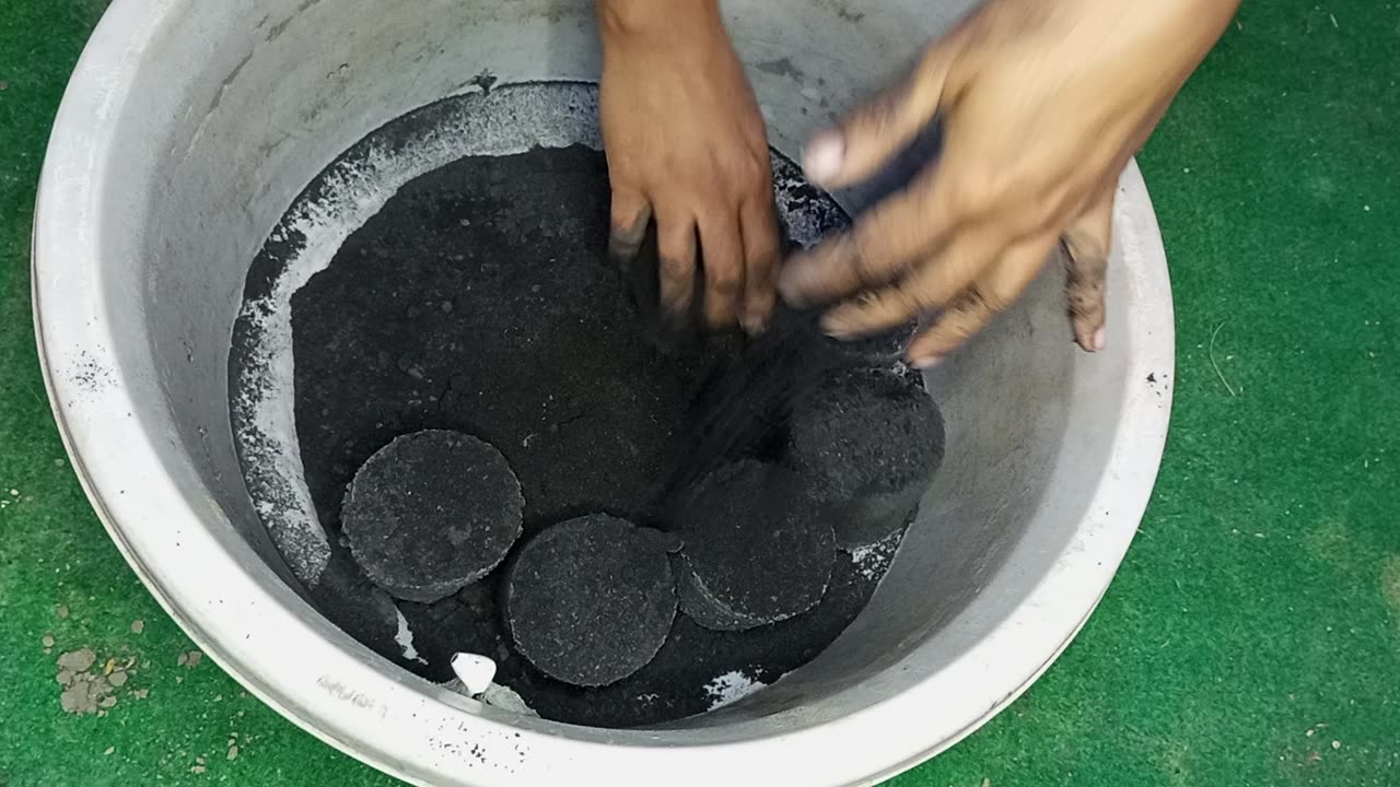 Pure charcoal dry crumbling in tube