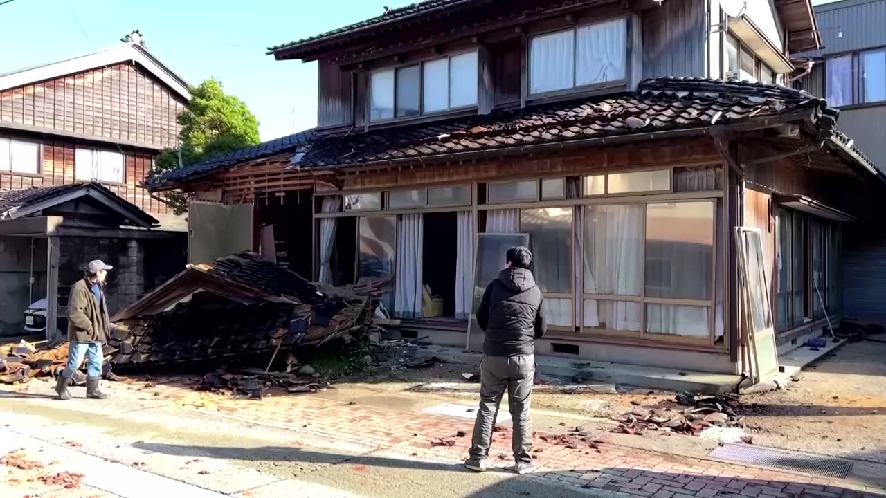 Rescuers rush to reach survivors of Japan's quake