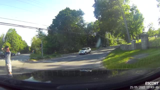 Cars Have a Head on Collision at Intersection Sparking Fire