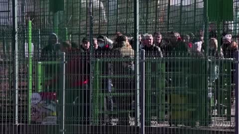 'It's hard to process': Ukrainians flee to Poland
