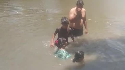 Children Learning Swimming