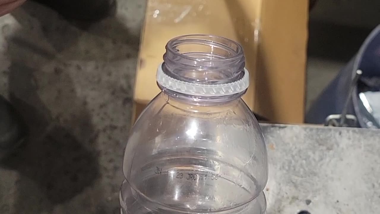 Improvising a Highspeed Top With an Air Compressor and Bottle