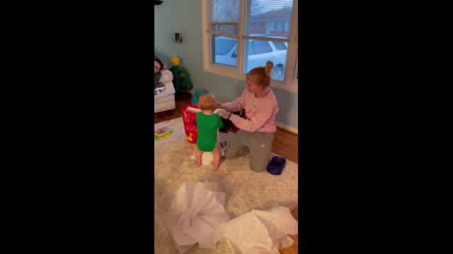 Baby has the sweetest reaction to gift blanket from auntie