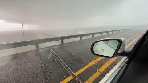 Meteorologists in Car Stand on Overpass to Experience Terrible Hailstorm