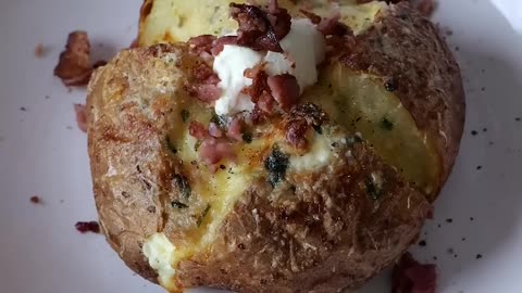 Cream cheese & garlic butter stuffed baked potato