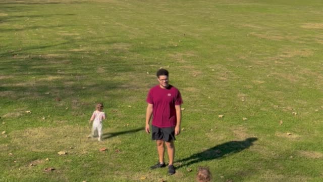 Twins Walking Down a Hill Fall Simultaneously