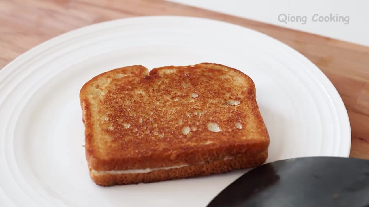 Quick breakfast ready in minutes! Delicious chocolate cheese toast I've never had