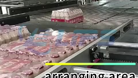 Robot palletizer with whole layer gripper for filmed bottles #packaging#palletizer#