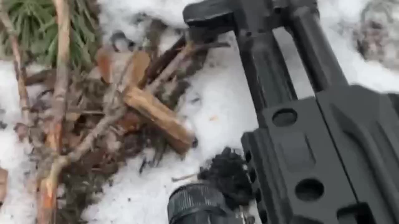 Footage of a gun battle between Russian and Ukrainian soldiers in the forests of Donbass