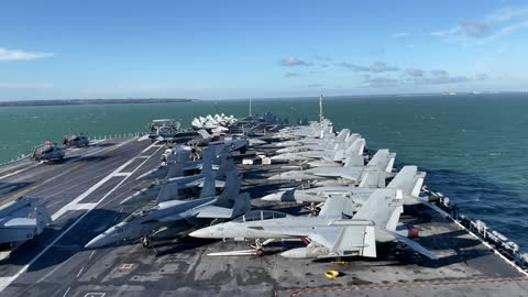 Huge warship USS Gerald R Ford moors off south coast of England