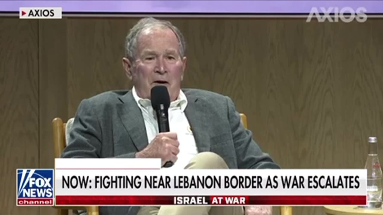 War Criminal Bush looking just like his war criminal pappy