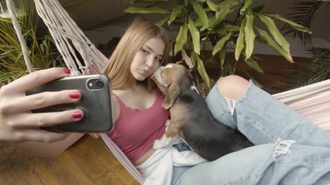 cute girl playing with dog